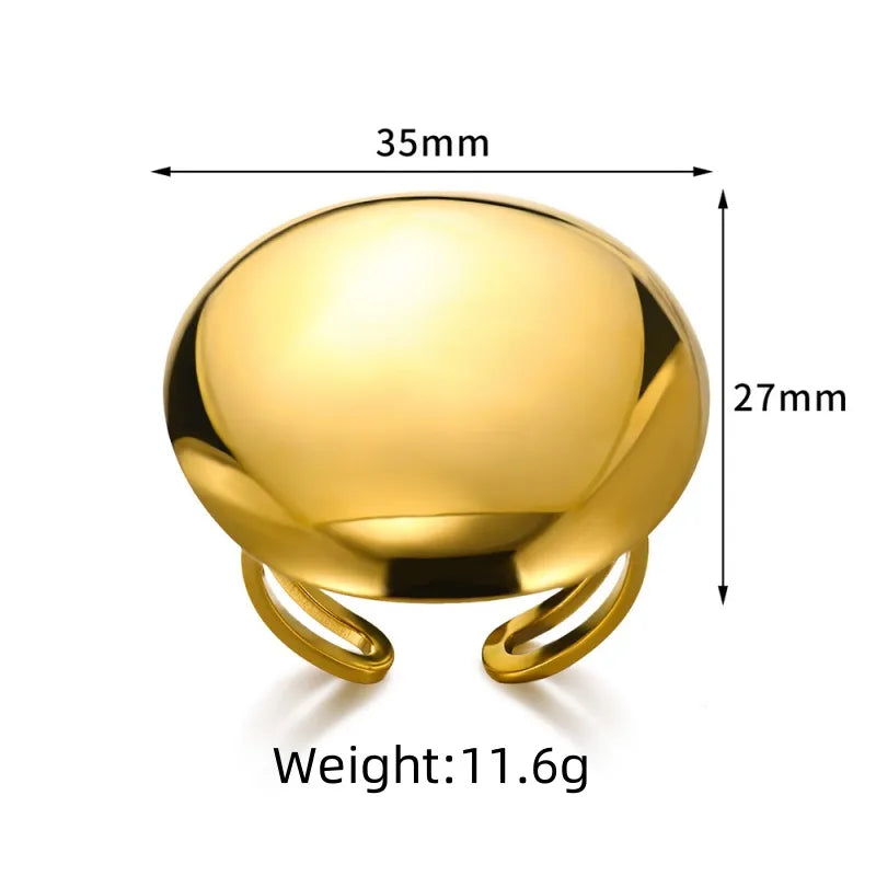 A23 - Anillo ajustable con circulo grande. Color dorado. Acero inoxidable.