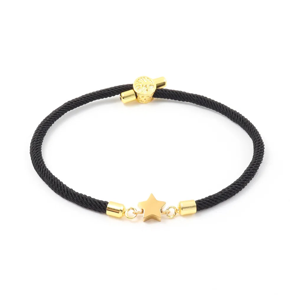 Pulsera ajustble de nilon con estrella. Color negro con dorado. Acero inoxidable.