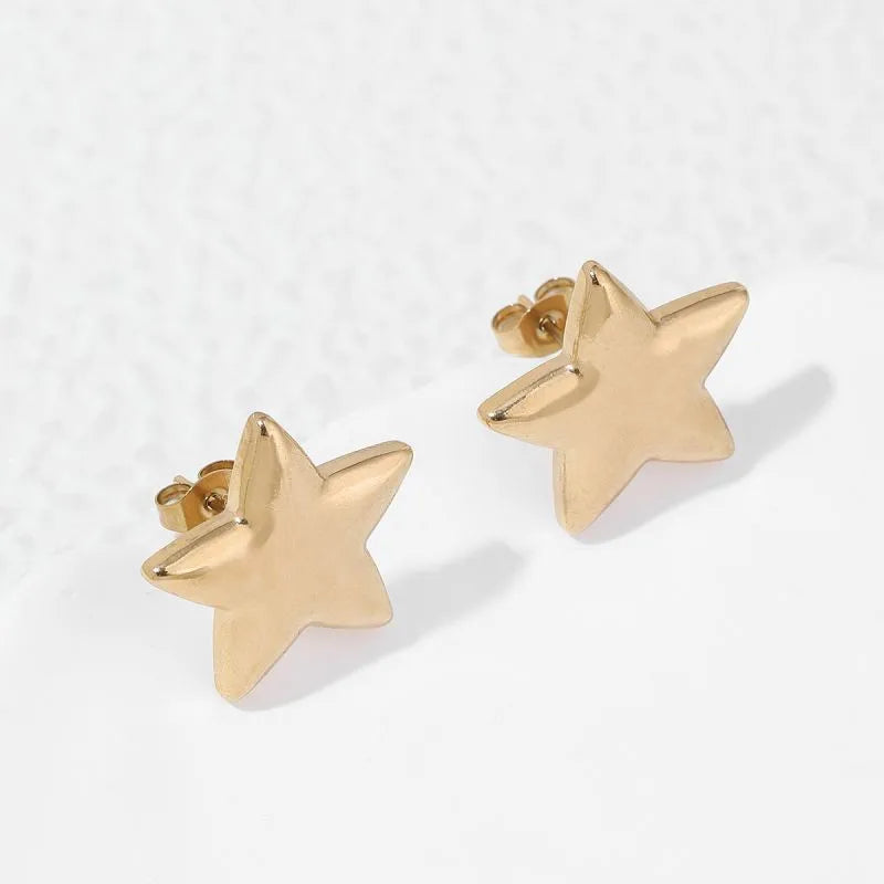 M03 - Aretes estrellas medianas. Color dorado. Acero inoxidable.