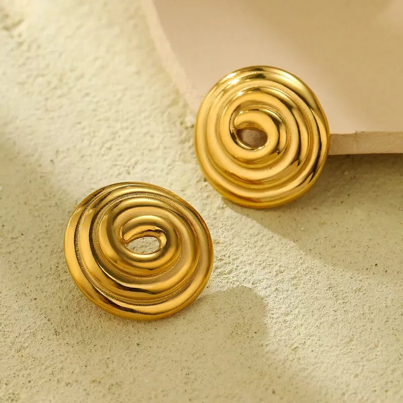 L10 - Arete espiral. Color dorado. Acero inoxidable.