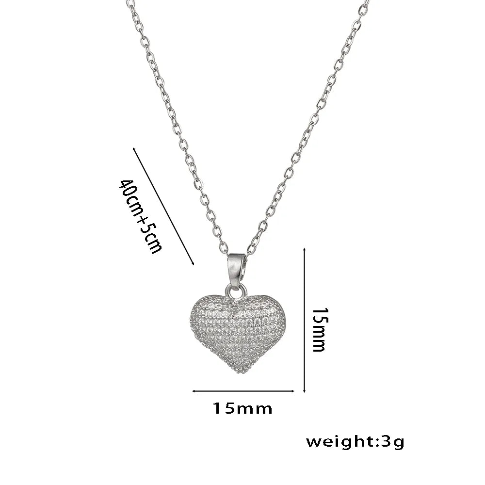 Collar dije de corazón con circonias. Color plateado. Acero inoxidable.