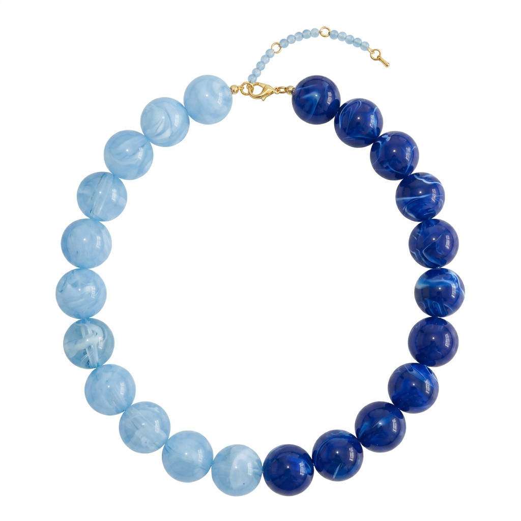 B20 - Collar bolas mitad azul cielo mitad azul real. Resina.