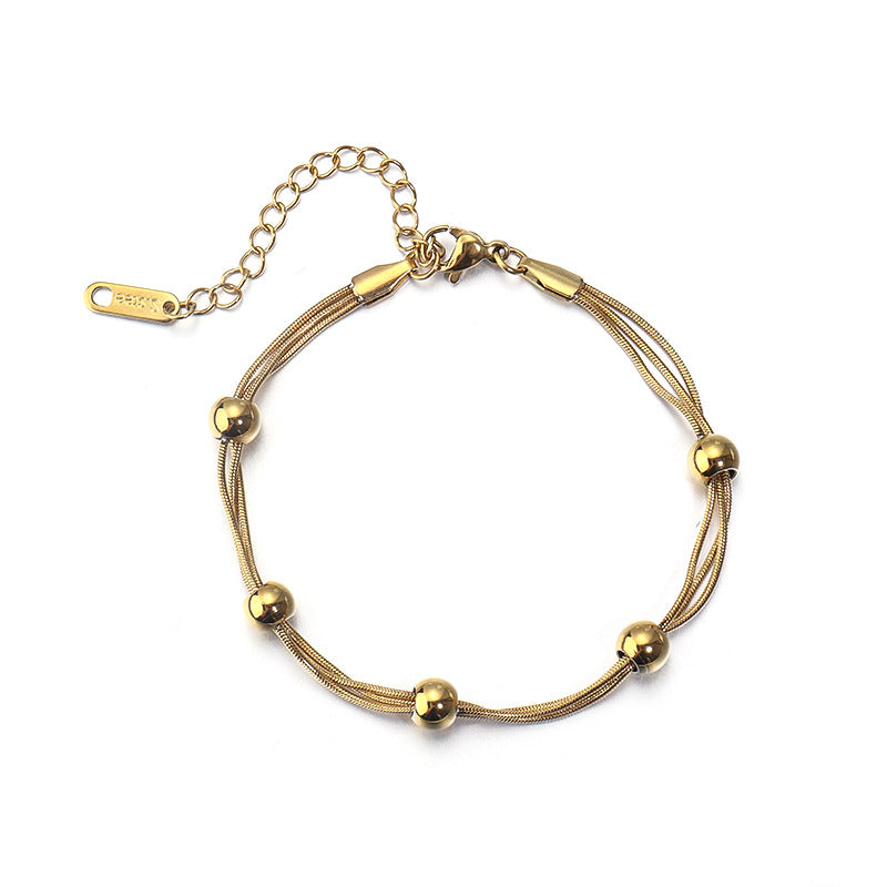 D11 - Pulsera múltiple. Color dorado. Acero inoxidable.
