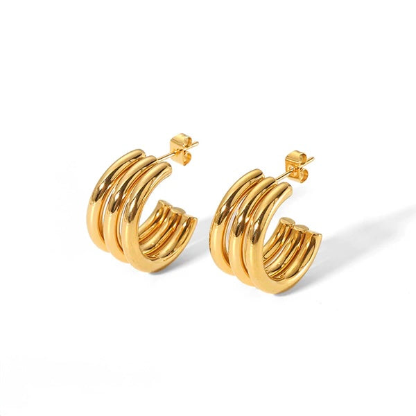 C14 - Arracadas triples. Color dorado. Acero inoxidable.