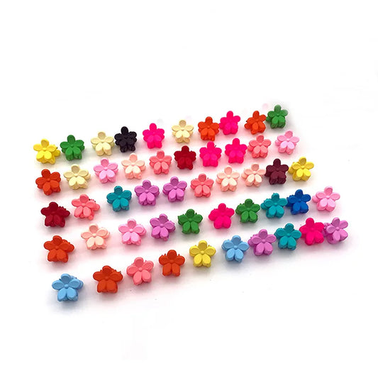 Brochitos para cabello en diferentes colores.
