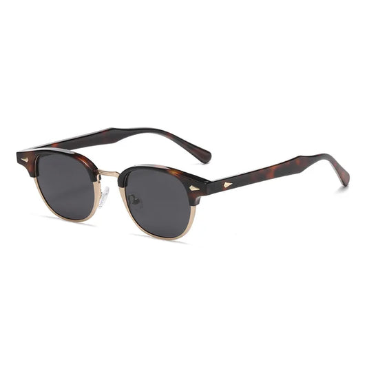 Lentes para sol. Armazón dorado con negro 5.