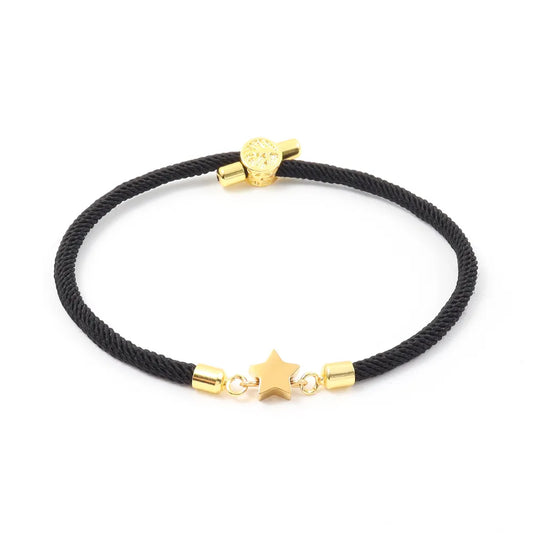 Pulsera ajustble de nilon con estrella. Color negro con dorado. Acero inoxidable.