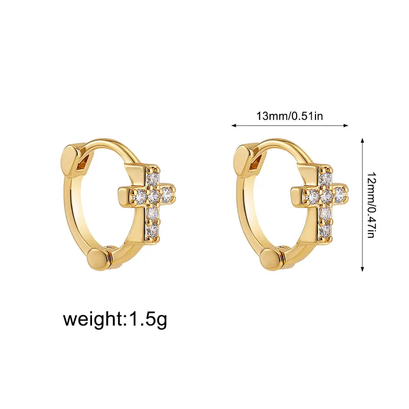 Arracadas chicas con cruz de circonias. Color dorado. Acero inoxidable.