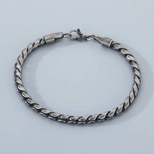 Pulsera unisex. Color plateado cromo. Acero inoxidable.