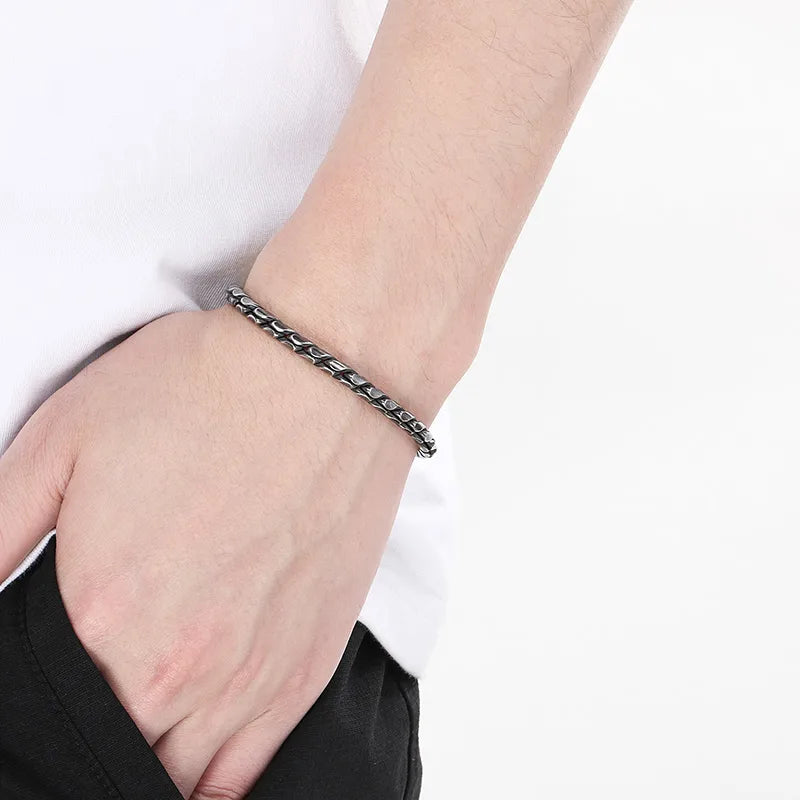 Pulsera unisex. Color plateado cromo. Acero inoxidable.