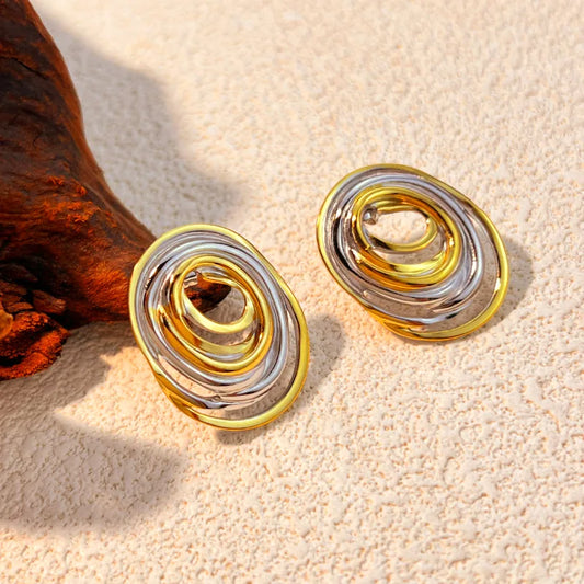 M02 - Aretes varios óvalos. Color dorado con plateado. Acero inoxidable.