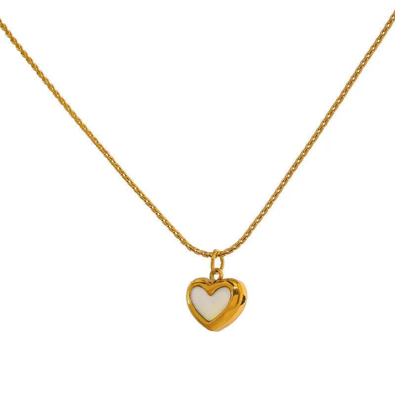 Collar dije de corazón con centro piedra blanca. Color dorado. Acero inoxidable.