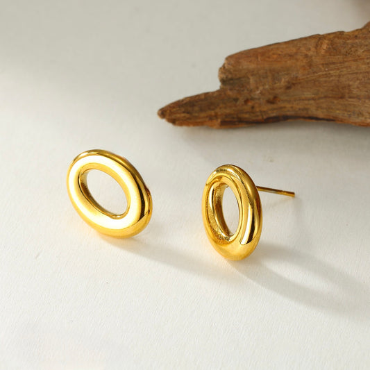 A18 - Aretes círculos chicos. Color dorado. Acero inoxidable.