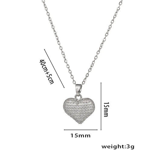Collar dije de corazón con circonias. Color plateado. Acero inoxidable.