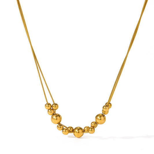 B15 - Collar varias esferas. Color dorado. Acero inoxidable.