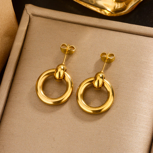 Aretes de círculo. Color dorado. Acero inoxidable.