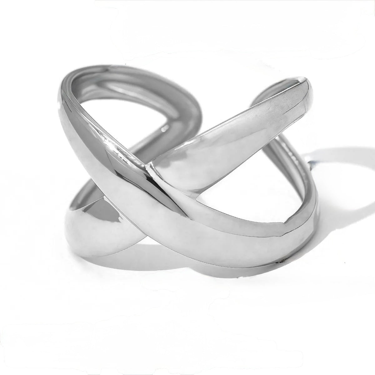 F20 - Anillo cruz, ajustable. Color plateado. Acero inoxidable.