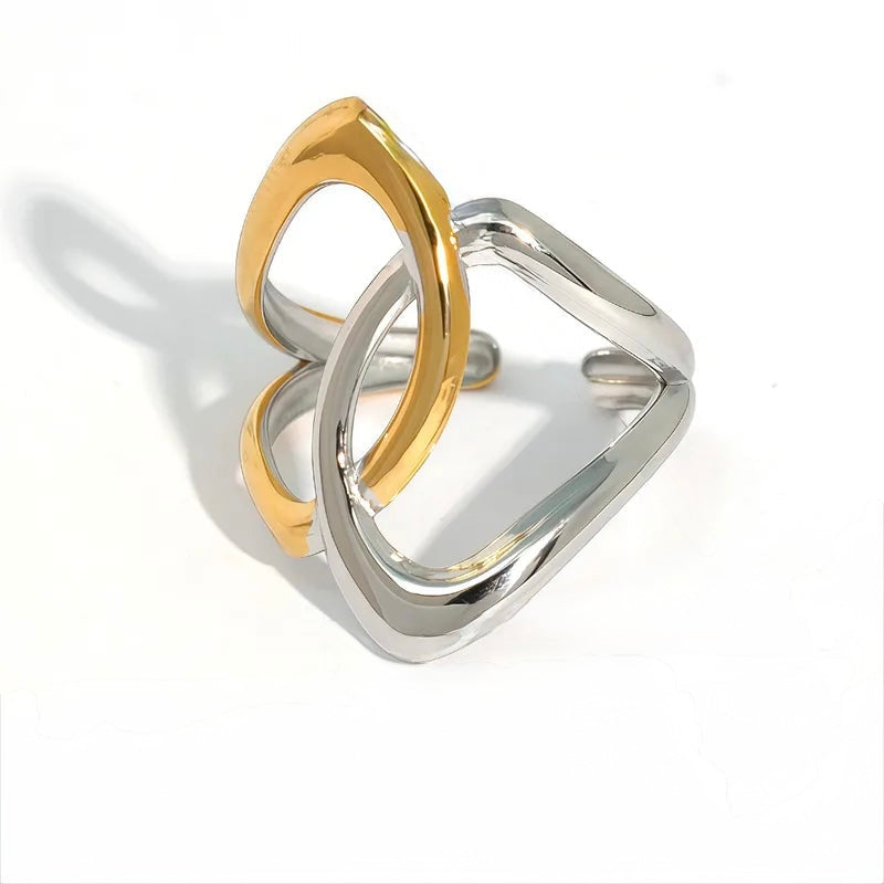 N03 - Anillo entrelazado, ajustable. Color dorado con plateado. Acero inoxidable.