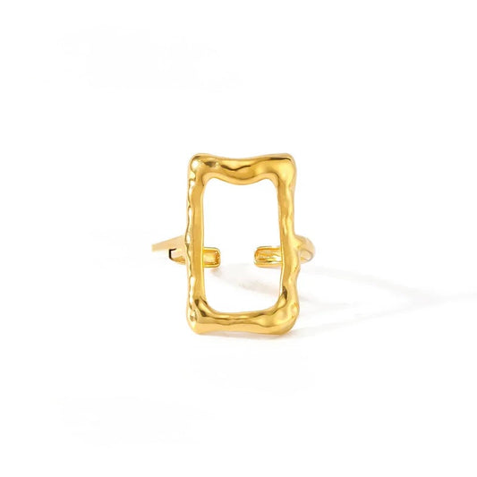 D09 - Anillo rectagunlo ajustable. Color dorado. Acero inoxidable.