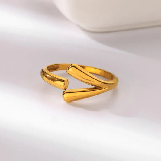 G08 - Anillo ajustable. Color dorado. Acero inoxidable.