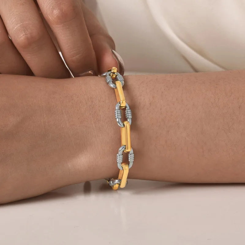 C20 - Pulsera eslabones gruesos. Color dorado con plateado. Acero inoxidable.