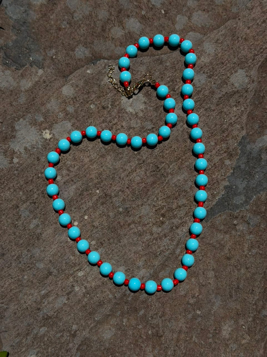 C08 - Collar turquesa naranja. Resina
