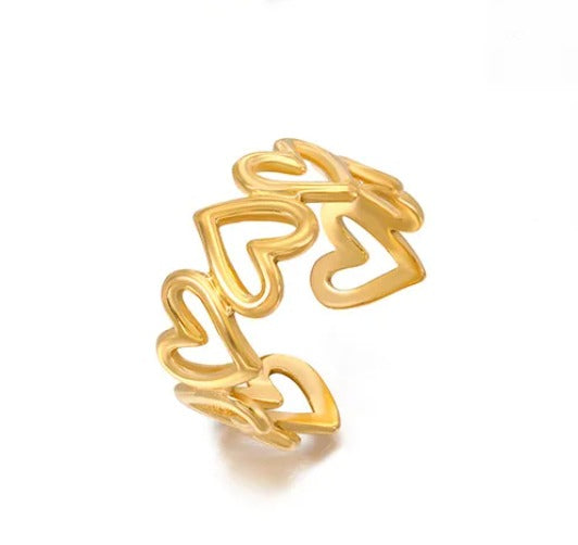 J06 - Anillo de corazones, ajustable. Color dorado. Acero inoxidable.