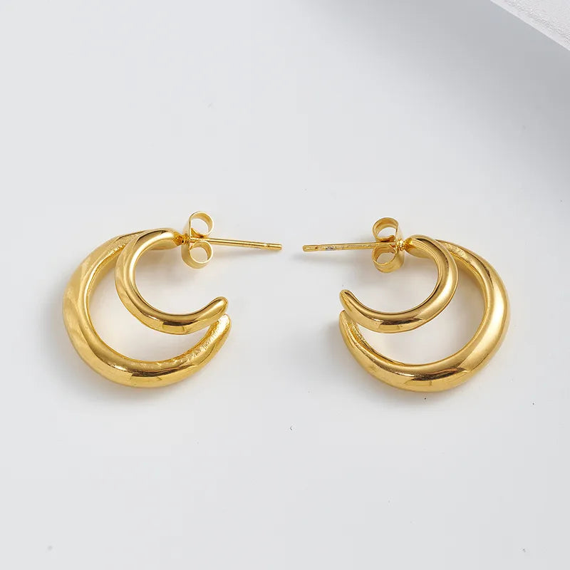 P06 - Arracadas dobles. Color dorado. Acero inoxidable.